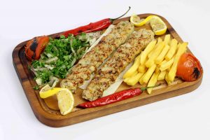Grilled meat served with rice