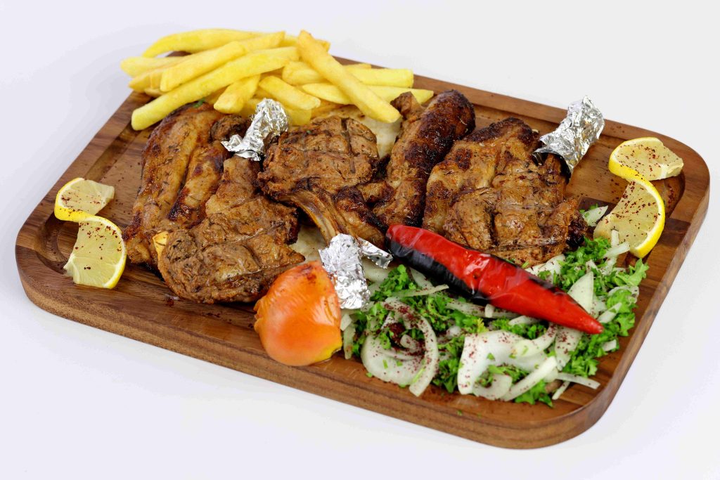 lamb chops ريش لحم seasoned juicy lamb chops served with mixed lemon and garlic sauce