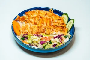 shawarma rice شاورما مع الرز chicken shawarma slices with white rice served with arabic salad, vegetables and result